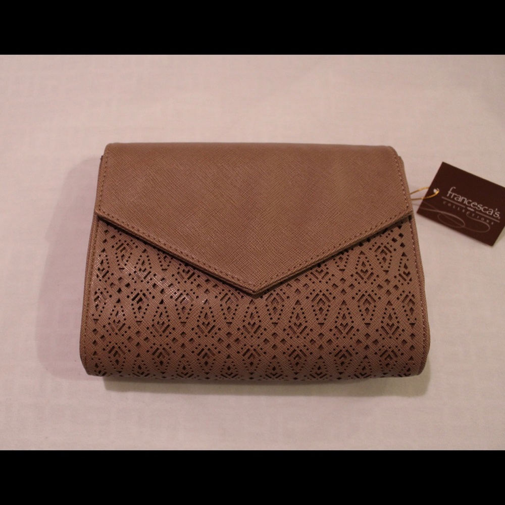 NWT. Tan purse with chain cross body attachment